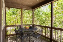 Deck of Sky Rock cabin with sitting area